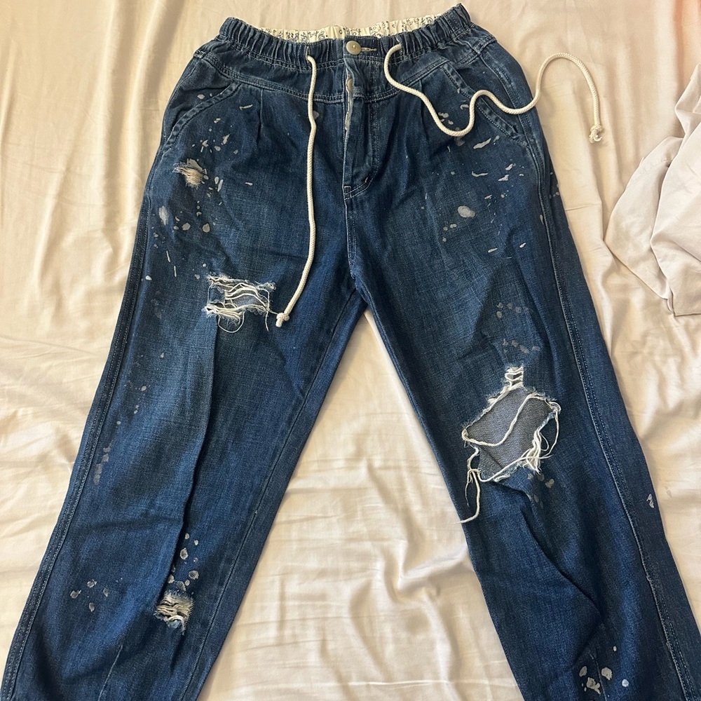 Free people distressed and painted drawstring jeans!